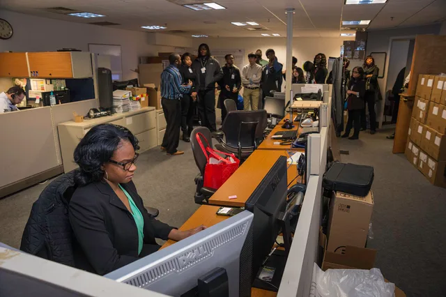 Samone Tracey, Office of the Chief Information Officer (OCIO) Washington Client Technology Center Help Desk/National Operations Center assists employees at the U.S. Department of Agriculture (USDA) with desktop support. Students from Charles H. Flowers High School in Springdale, Maryland observe in. Productivity service standards that begin with user-critical moments